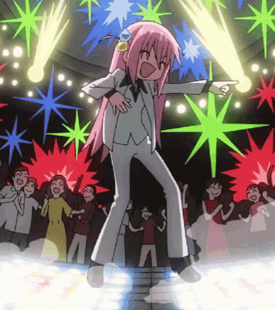 a girl with pink hair and a white suit is dancing in front of a crowd