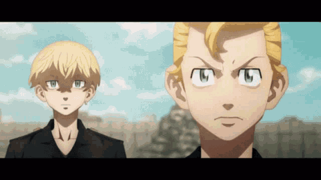 two anime characters are standing next to each other looking at the camera .