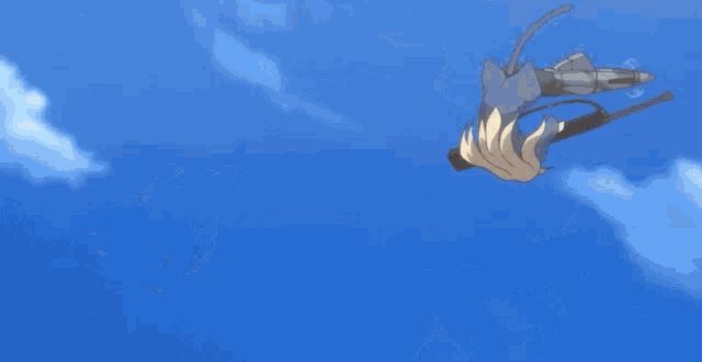 a girl in a blue uniform is kicking a plane in the air