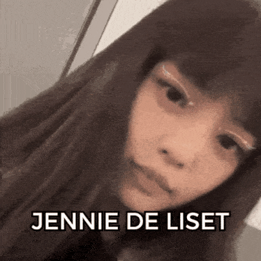 a close up of a woman 's face with the words jennie de liset on the bottom .