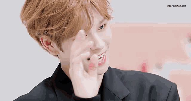 a close up of a person 's face with the words deep breath rm below