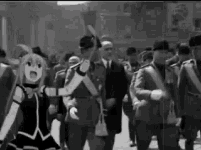 a black and white photo of a group of people walking down a street with a girl in the middle .