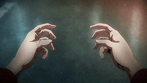 a pair of hands reaching out towards each other with a red string between them