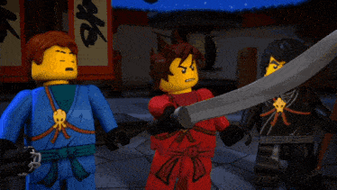 a group of lego ninjas are standing next to each other holding swords