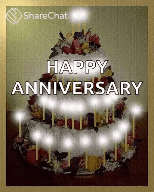 a cake with candles and the words happy anniversary written on it