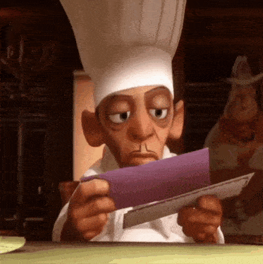 a cartoon chef looks at a piece of paper