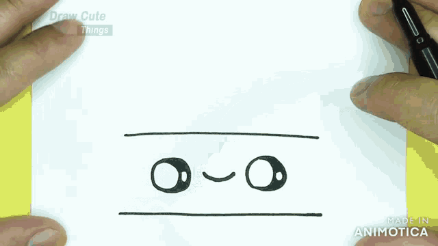 a person is drawing a face on a piece of paper with the words draw cute things written on the bottom