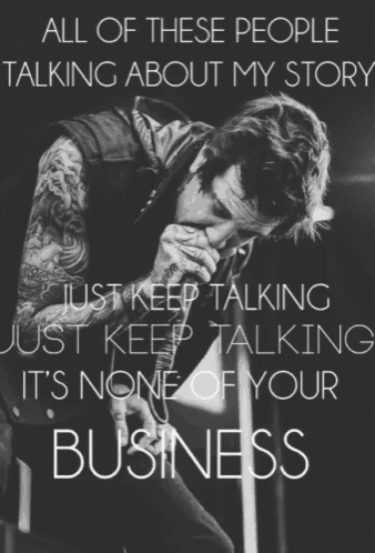 a man singing into a microphone with the words " all of these people talking about my story just keep talking just keep talking "