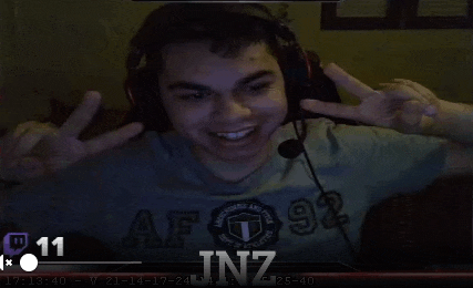 a young man wearing headphones and a shirt that says af 92