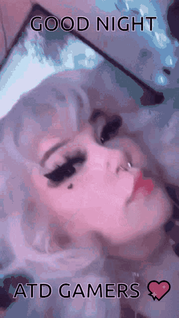 a picture of a girl with the words good night atd gamers on it