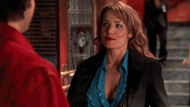 Erica Durance Look What I Got GIF - Erica Durance Look What I Got Smallville GIFs