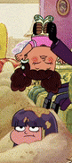 a cartoon character is laying upside down on a bed