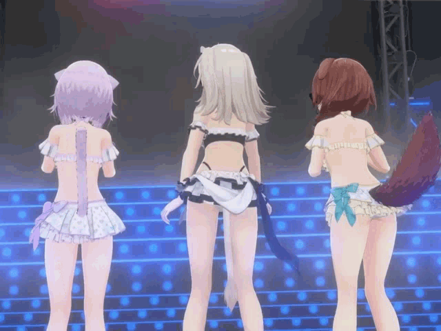three anime girls are standing on a stage and one has a tail