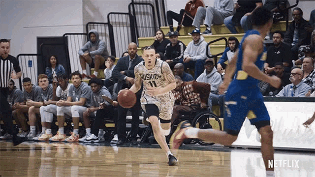 a basketball game is being played with a netflix logo in the corner