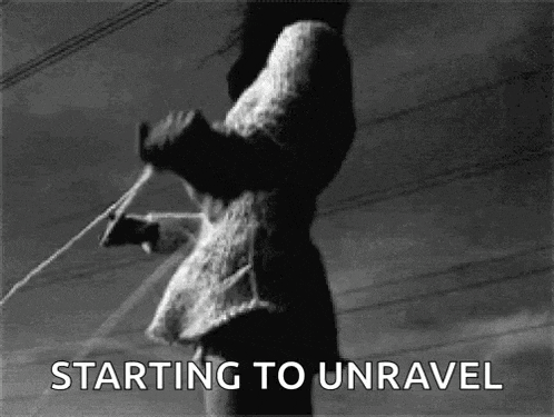 a black and white photo of a person holding a rope with the words `` starting to unravel '' written below it .