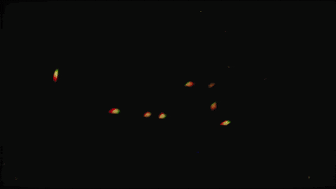 a blurry image of the word xcalia with a black background