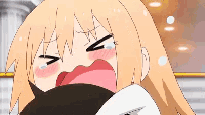 a close up of a cartoon character crying with her mouth open .