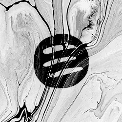 a black and white photo of a marbled background with a circle in the middle