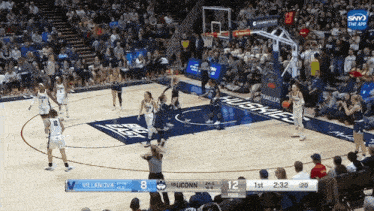 a basketball game between villanova and uconn is going on