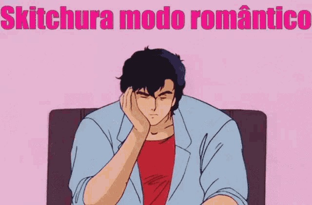 a man is sitting on a couch with his hand on his face and the words skitchura modo romantico written above him .