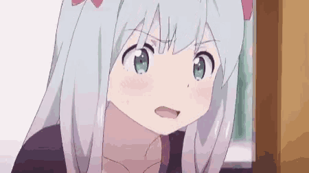a close up of a anime girl with white hair and green eyes looking at the camera .