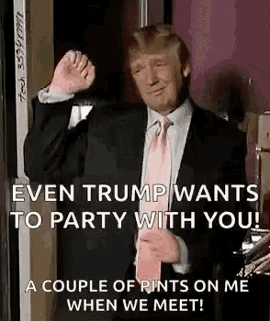 donald trump is wearing a suit and tie and giving a thumbs up sign .