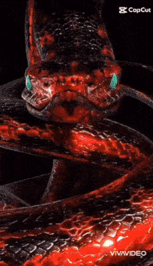 a close up of a snake 's mouth with its eyes glowing red .