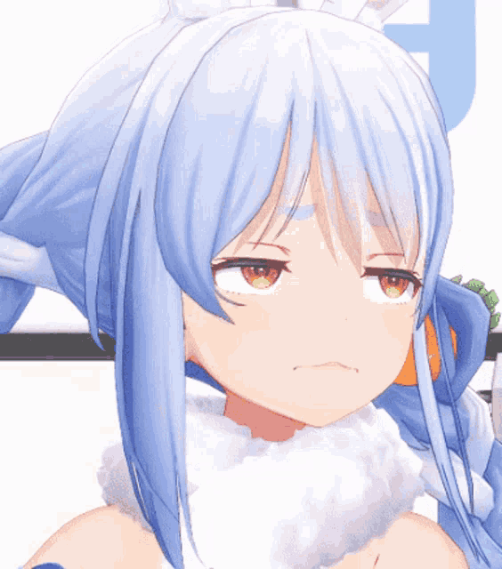 a close up of a cartoon character 's face with blue hair