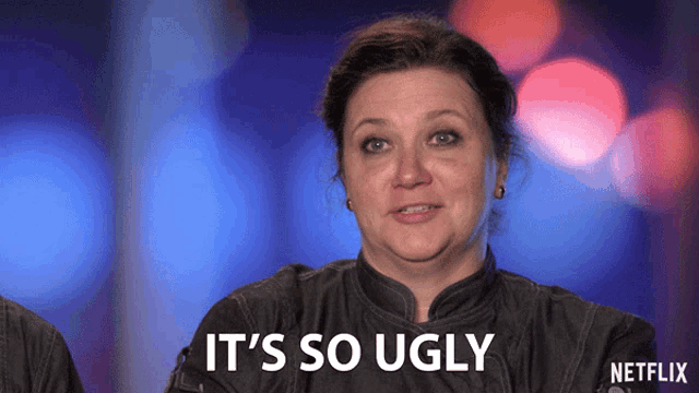 a woman says it 's so ugly while wearing a black jacket