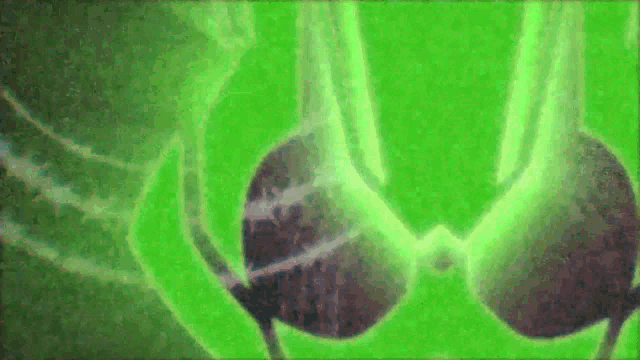 a close up of a green background with a few dots on it