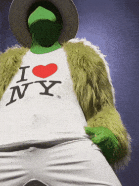 a person wearing a white shirt that says i heart ny