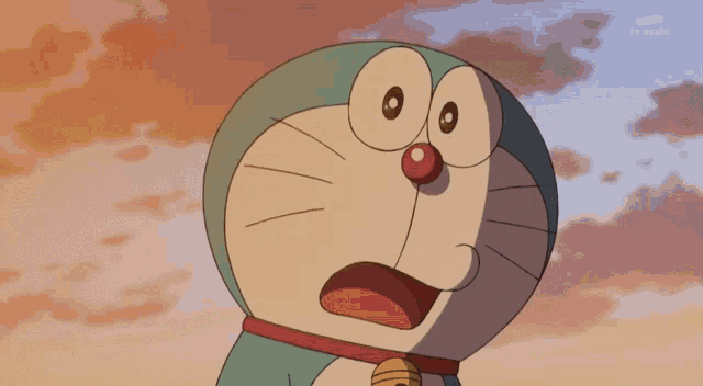 a close up of doraemon 's face with a tv asahi logo in the corner