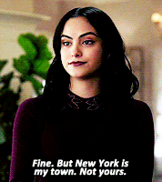 a woman is standing in front of a plant and says fine but new york is my town not yours
