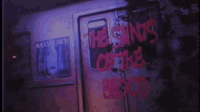 a sign that says the sins of the blood is on a door