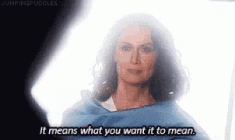 a woman is wrapped in a blue blanket and says `` it means what you want it to mean . ''