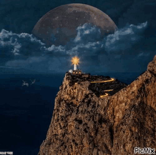 a picture of a lighthouse on top of a rocky hill with a full moon behind it
