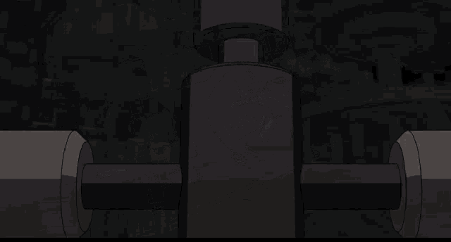 a dark room with a few pieces of wood and a few pieces of metal