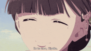 a close up of a girl 's face with the words eu te amo written below her