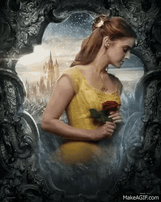a woman in a yellow dress is holding a rose in front of a mirror