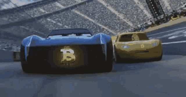 a blue car with the letter b on the back of it