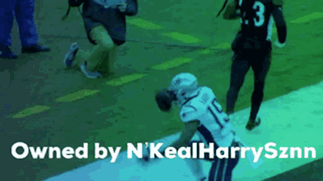 a football player with the number 10 on his jersey is on the field
