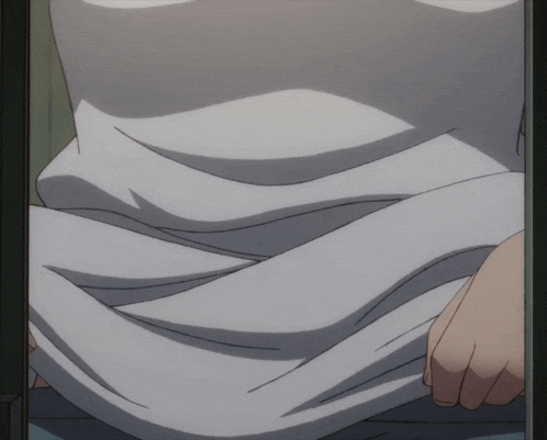a person 's torso is shown in a close up of a white shirt