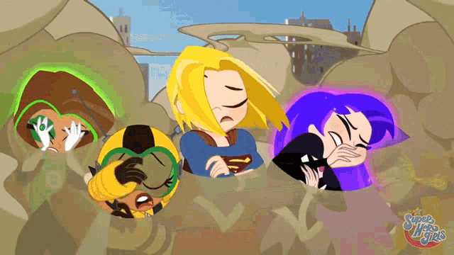 a group of super hero girls are laying in the dirt