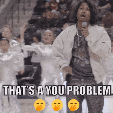 a man singing into a microphone with the words that 's a you problem below him