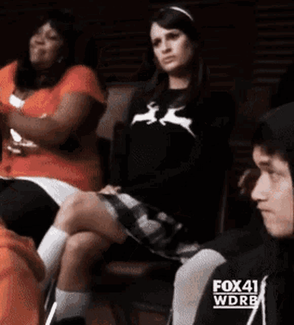 a group of people sitting in a room with fox 41 wdrb on the bottom