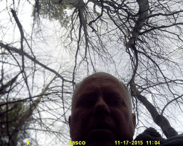 a man taking a picture of himself with the date 11-17-2015 at the bottom