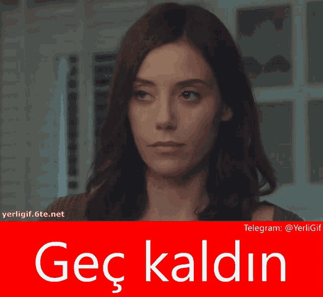 a woman 's face is behind a red sign that says " geç kaldin "