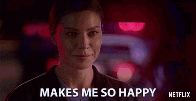 a woman says " makes me so happy " in front of police lights