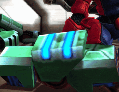 a green cube with a blue stripe on the bottom