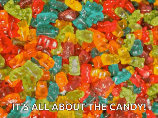 a pile of colorful gummy bears with the words `` it 's all about the candy ''